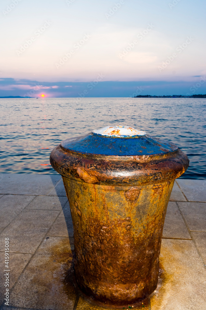 Old ship bollard at the beach of Zadar city in Croatia Old ship bollard at the beach of Zadar city in Croatia