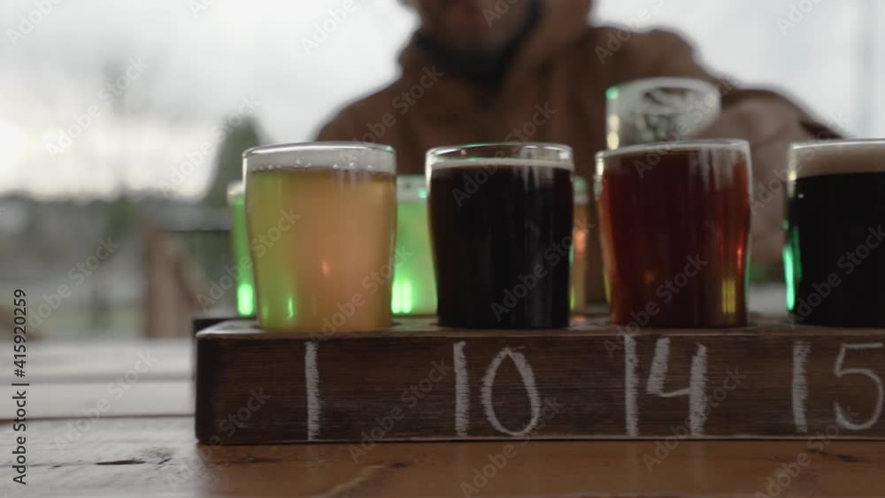 Man drinking beer at brewery