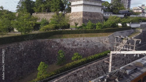 Wallpaper Mural Fukuyama Castle and Train Station, Tilt Reveal Shot in Hiroshima Prefecture Torontodigital.ca