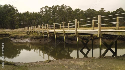 Wallpaper Mural 4K close up on a wooden food path over a low tide pond in the Ria de Aveiro on the estuary of the river Vouga. Torontodigital.ca