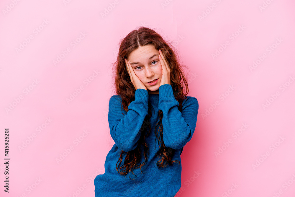 Little caucasian girl isolated on pink background whining and crying disconsolately. Little caucasian girl isolated on pink background whining and crying disconsolately.