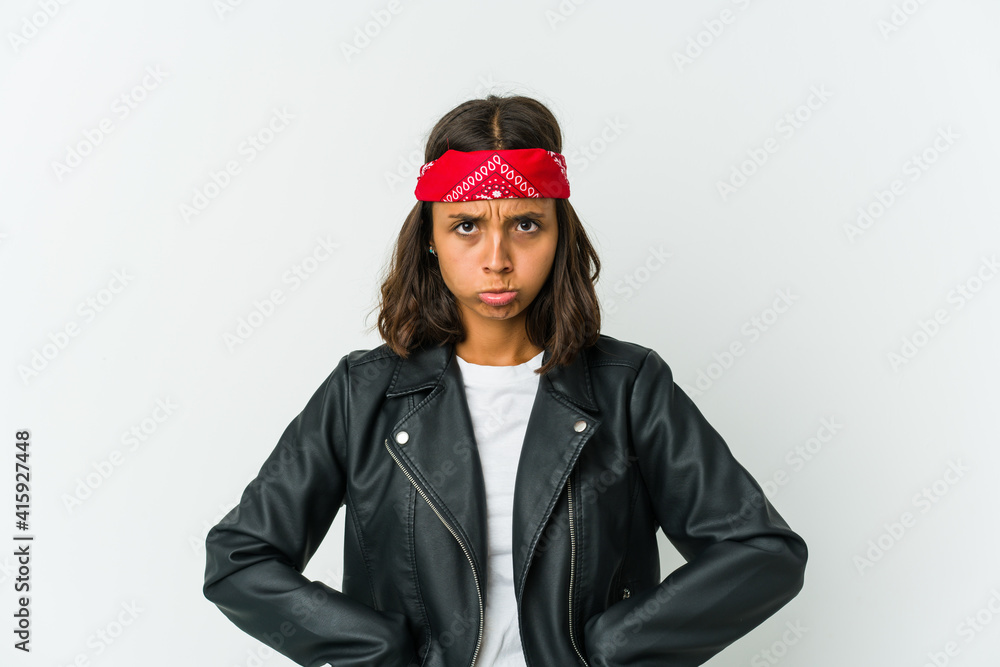 Young latin rocker woman isolated on white background Young latin rocker woman isolated on white background