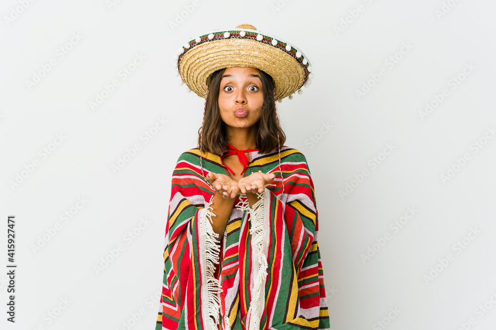 Young mexican woman isolated on white background Young mexican woman isolated on white background