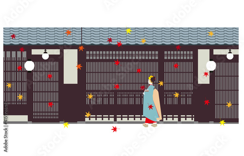 日本の古い町屋の建物と紅葉と少女