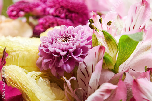 Colorful bouquet of flowers with chrysanthemum and carnations for the wedding. Floral and herbal backgrounds