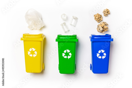 Recycled plastic. Bin container for disposal garbage waste and save environment. Yellow, green, blue dustbin for recycle paper and glass can trash isolated on white background.