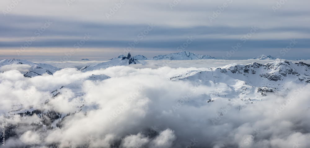 Beautiful Aerial Panoramic View of Whistler Mountain during a sunny winter day. Taken from Blackcomb Peak, Whistler, British Columbia, Canada. Canadian Nature Landscape Panorama Beautiful Aerial Panoramic View of Whistler Mountain during a sunny winter day. Taken from Blackcomb Peak, Whistler, British Columbia, Canada. Canadian Nature Landscape Panorama