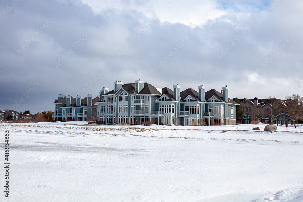 Collingwood's Lighthouse Point is a waterfront condo on Georgian Bay, overlooking the water as well as Blue Mountain. It features walking trails and many shared amenities.