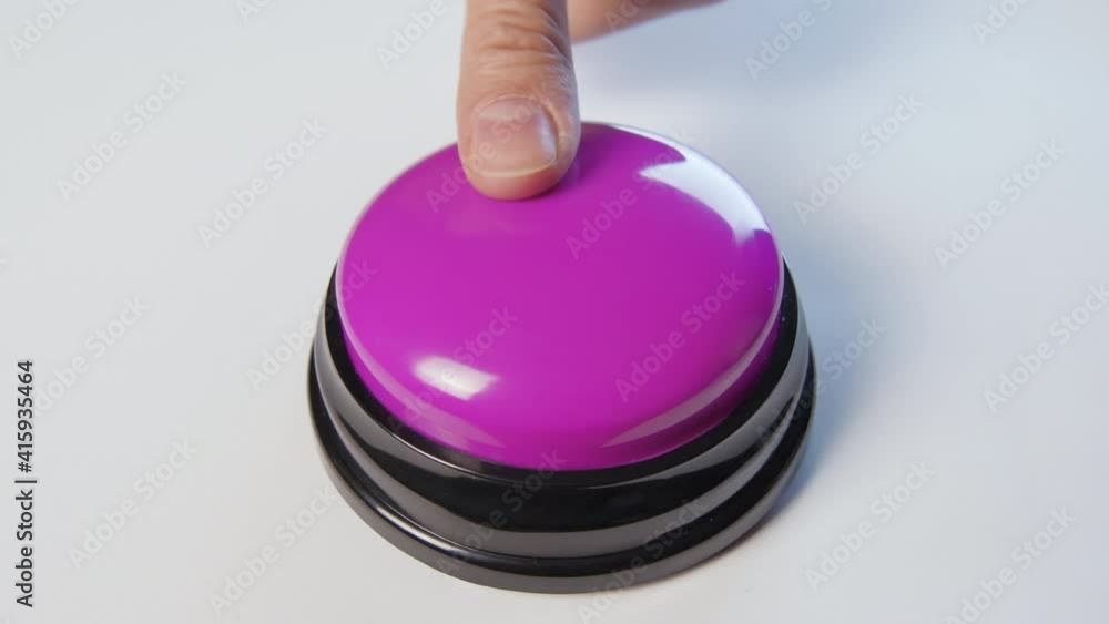 Young woman pushing purple button with a finger and palm of her hand