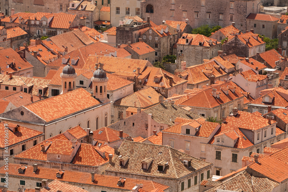 Croatia, Dubrovnik. Historic walled city and UNESCO World Heritage Site, red tile roofs. Croatia, Dubrovnik. Historic walled city and UNESCO World Heritage Site, red tile roofs.