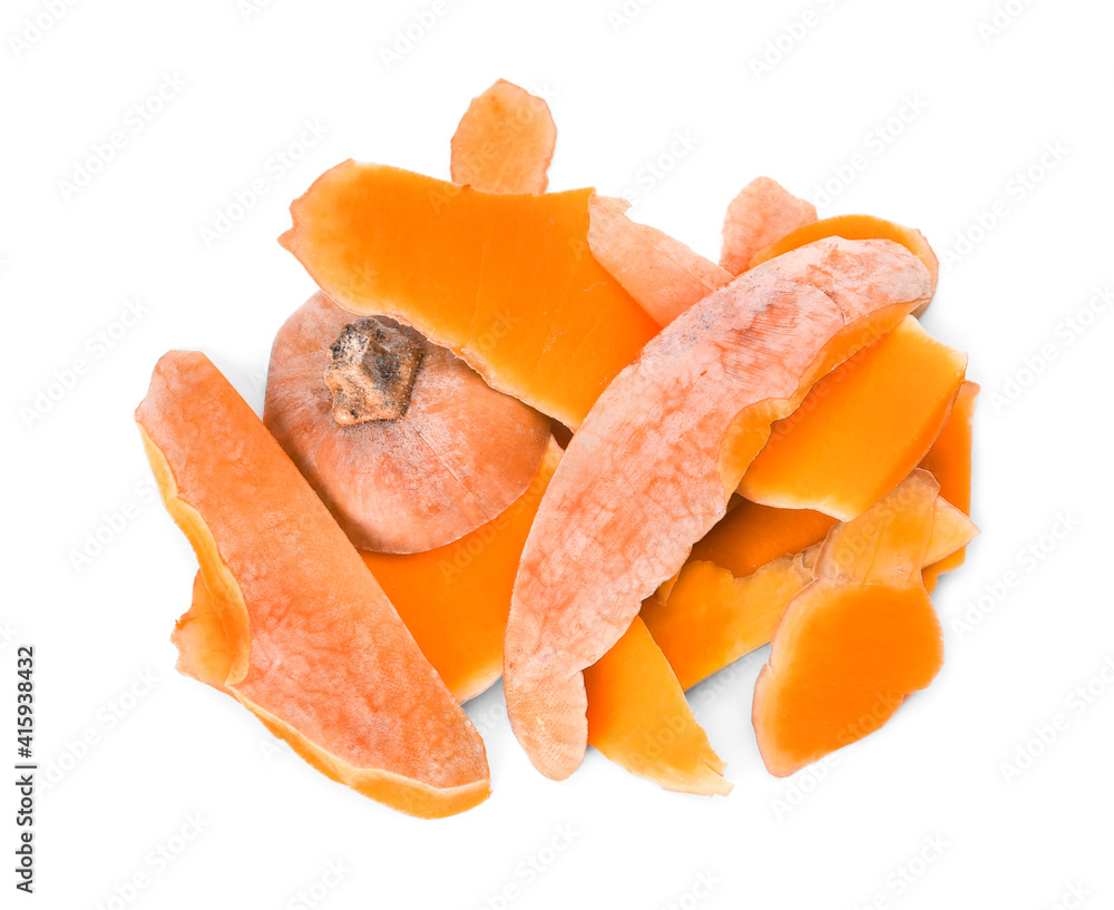 Pumpkin peel on white background, top view. Composting of organic waste Pumpkin peel on white background, top view. Composting of organic waste