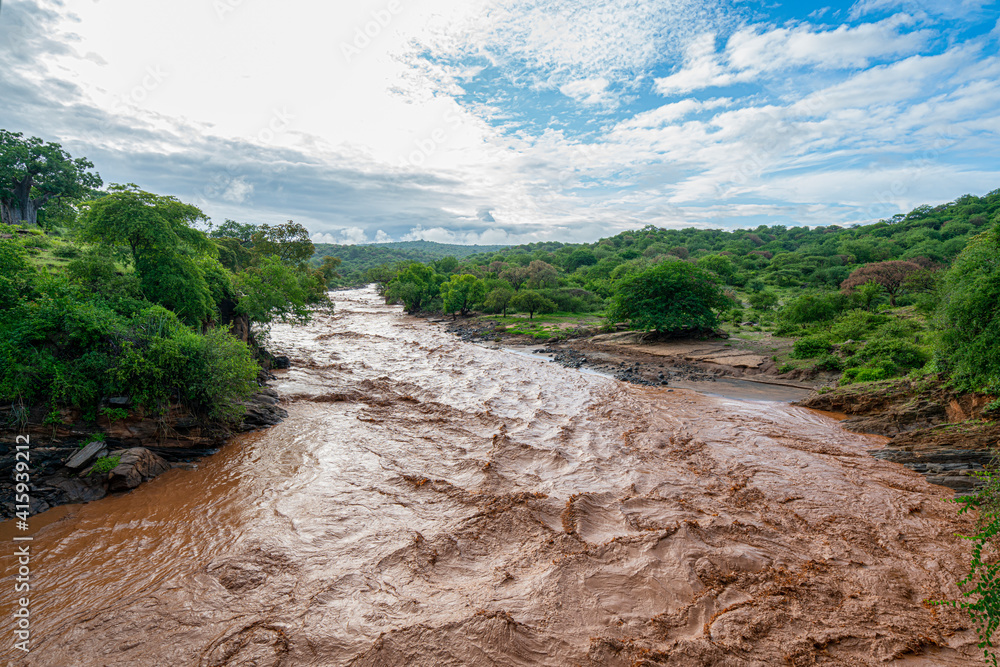 Rapid dirty river in Tanzania Africa Rapid dirty river in Tanzania Africa