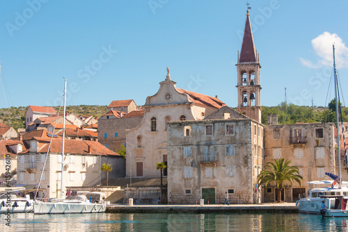 Croatia, Brac, Milna. Church of our Lady of the Annunciation 18th century dominates waterfront.