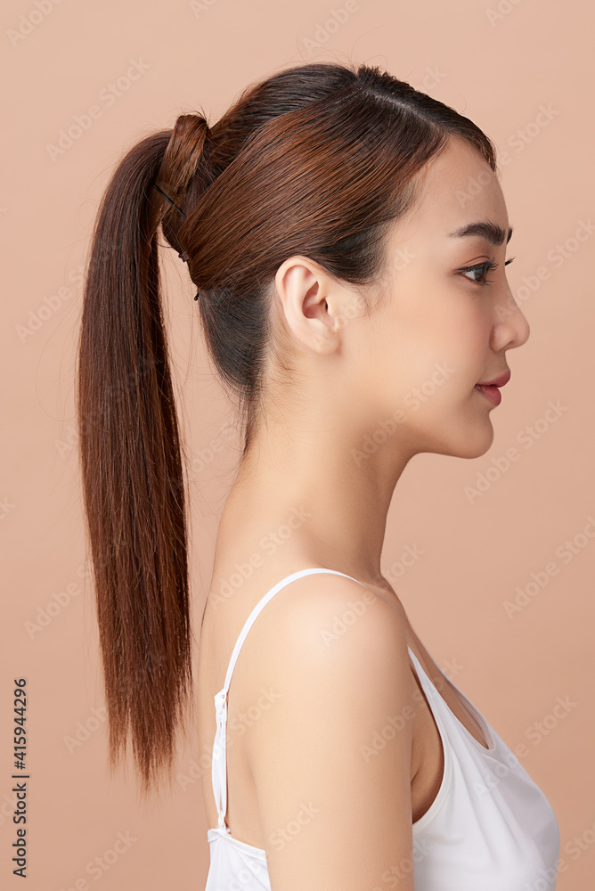 Fototapeta premium Beautiful young asian woman with clean fresh skin on white background, Face care, Facial treatment, Cosmetology, beauty and spa, Asian women portrait