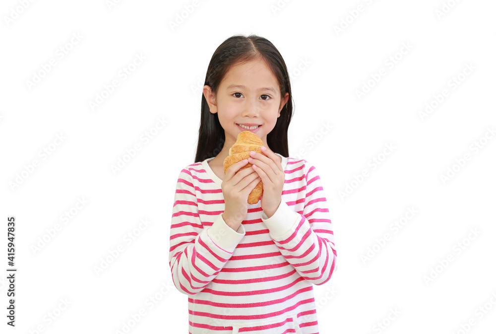 Portrait Asian little child girl eating croissant isolated on white background. Portrait Asian little child girl eating croissant isolated on white background.