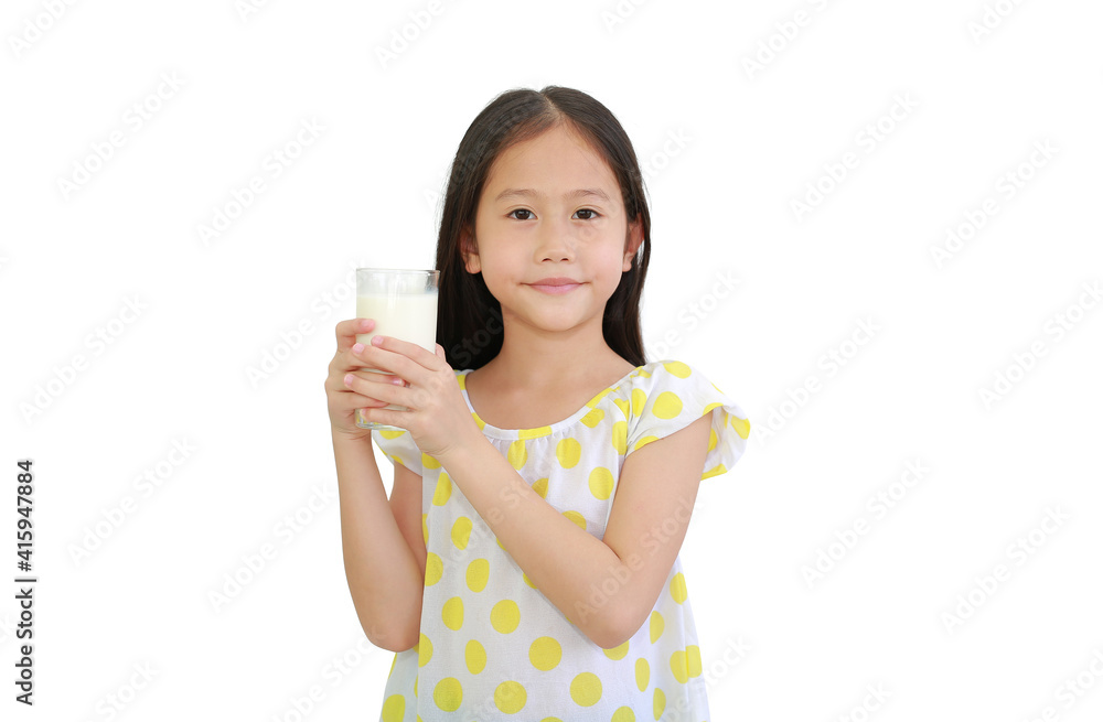 Portrait of Asian little child holding glass of milk isolated on white background Portrait of Asian little child holding glass of milk isolated on white background
