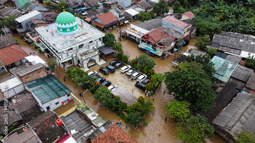 Aerial POV view Depiction of flooding. devastation wrought after massive natural disasters. BEKASI, WEST JAVA, INDONESIA. FEBRUARY 23, 2021