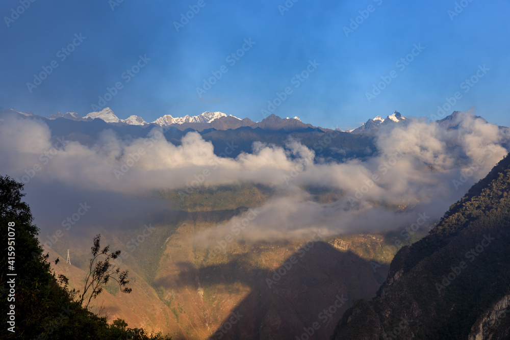 A group of clouds in the sky over The Andes mountains. View from Machu Picchu old Inca trail.