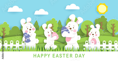 Easter day banner with cute rabbits and easter eggs. © Nattapohn