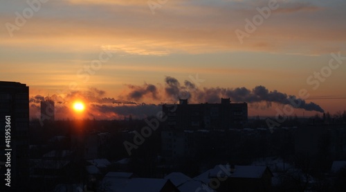 silhouette of the city during sunrise, frosty morning of a small Ukrainian city