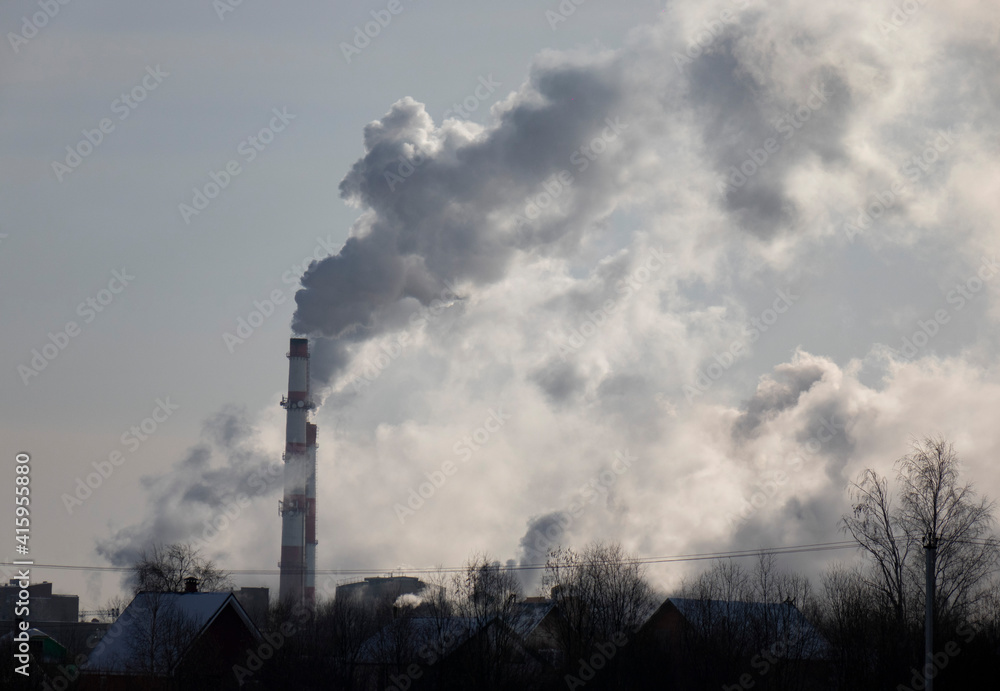 Smoke from the factory chimney. The concept of environmental protection Smoke from the factory chimney. The concept of environmental protection