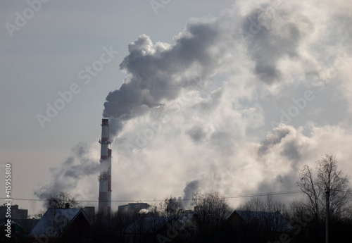 Smoke from the factory chimney. The concept of environmental protection