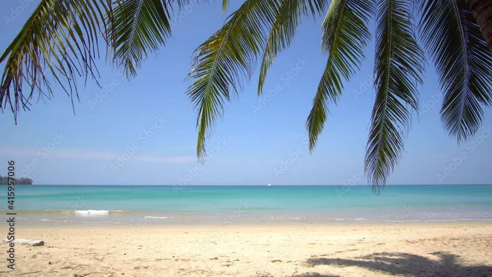 Phuket beach sea sand and sky. Nature video Scene of Landscape view of beach sea in summer day. Palm on beach sea. At Karon Beach, Phuket, Thailand. . 4K UHD. Video Clip Phuket beach sea sand and sky. Nature video Scene of Landscape view of beach sea in summer day. Palm on beach sea. At Karon Beach, Phuket, Thailand. . 4K UHD. Video Clip