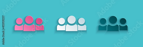 Paper cut Users group icon isolated on blue background. Group of people icon. Business avatar symbol - users profile icon. Paper art style. Vector.