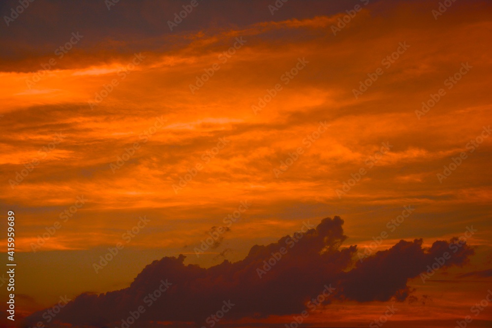 impression clouds. from golden hour sky. texture background with copy space. Vivid tone・soft focus image.