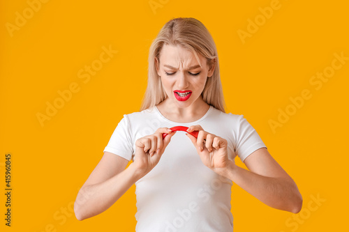 Displeased young woman with...