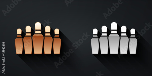 Gold and silver Bowling pin icon isolated on black background. Long shadow style. Vector.