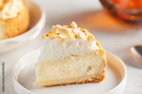 Delicious homemade cheesecake with glazed merengue.