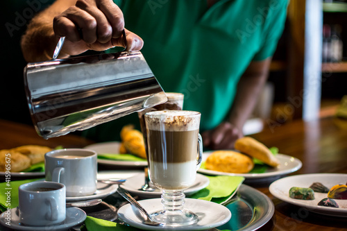 bartender pouring COFEE