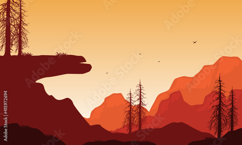 A beautiful silhouette of the mountains at sundown on a warm afternoon. Vector illustration