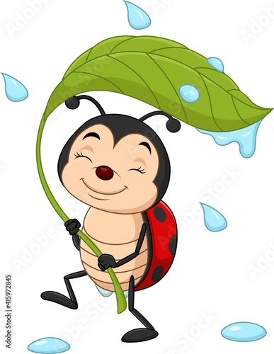 Cartoon ladybug holding a green leaf