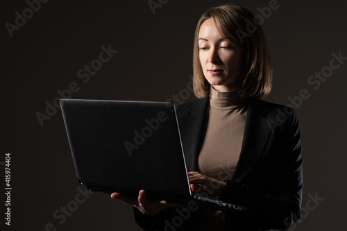 Woman with a laptop in her ...