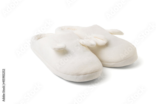 Stylish white home slippers isolated on a white background.