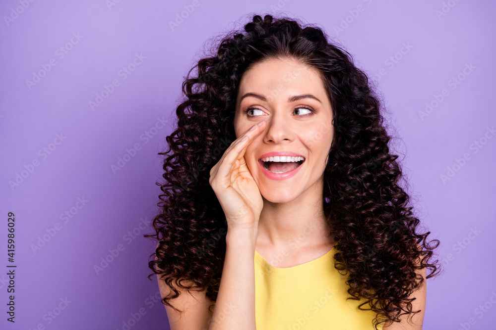 Portrait of cheerful lady hand near open mouth look empty space talk isolated on pastel purple color background Portrait of cheerful lady hand near open mouth look empty space talk isolated on pastel purple color background