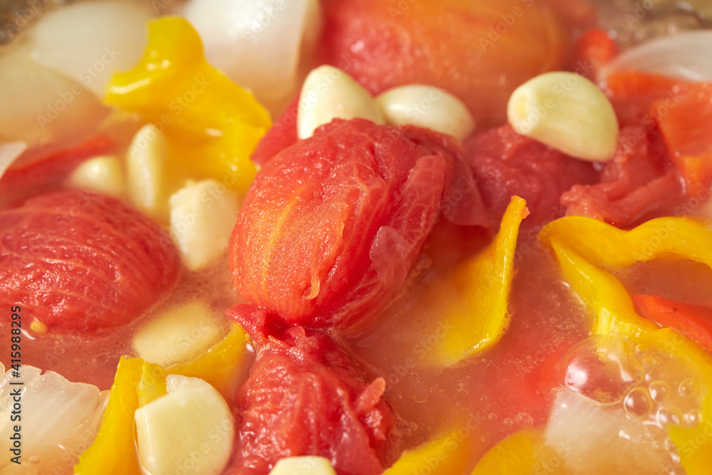Vegetable soup mixed with peeled tomatoes Vegetable soup mixed with peeled tomatoes