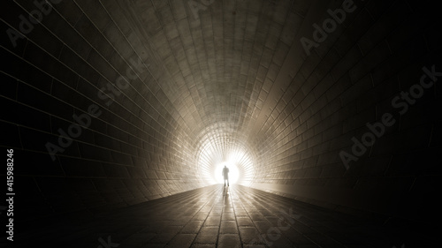 Concept or conceptual dark tunnel with a bright light at the end or exit as metaphor to success, faith, future or hope, a black silhouette of walking man to new opportunity or freedom 3d illustration