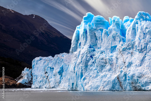 The Perito Moreno Glacier is a glacier located in the Los Glaciares National Park in Santa Cruz Province, Argentina. Its one of the most important tourist attractions in the Argentinian Patagonia. photo