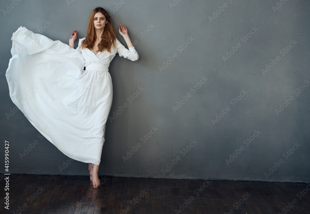 Woman in white dress performance luxury glamor model Woman in white dress performance luxury glamor model