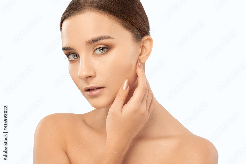 Portrait of a beautiful brunette girl with healthy clean skin and fresh make-up. Aesthetic cosmetology and makeup concept. Portrait of a beautiful brunette girl with healthy clean skin and fresh make-up. Aesthetic cosmetology and makeup concept.