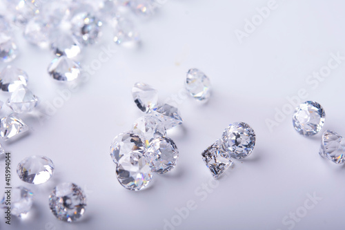 Diamond with tweezers and magnifier.Gemstone Beauty