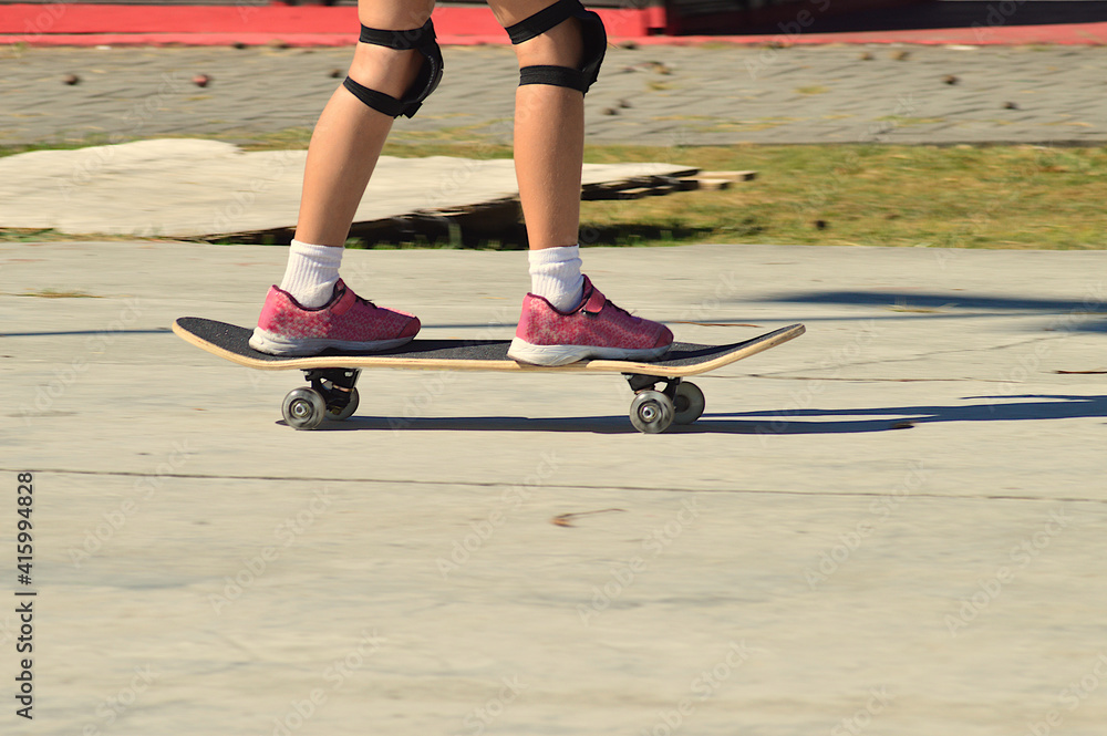 young girl running on roller skates