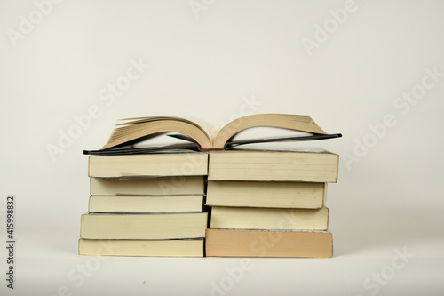 stack of books on white background literture libary photo