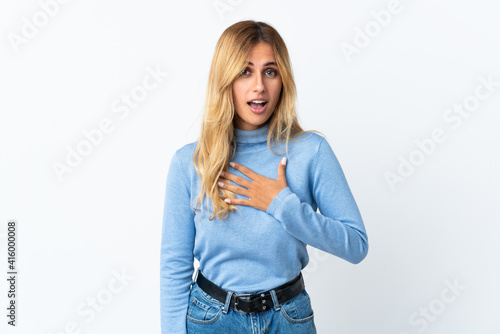 Young blonde Uruguayan woman over isolated background pointing to oneself © luismolinero