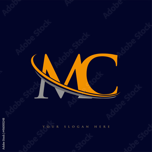 initial letter MC logotype company name yellow and grey swoosh design. isolated on dark background.