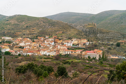 Panoramic view of the village of Talamantes with the castle on top of the mountain, Talamantes, Zaragoza, Spain. © Chemari
