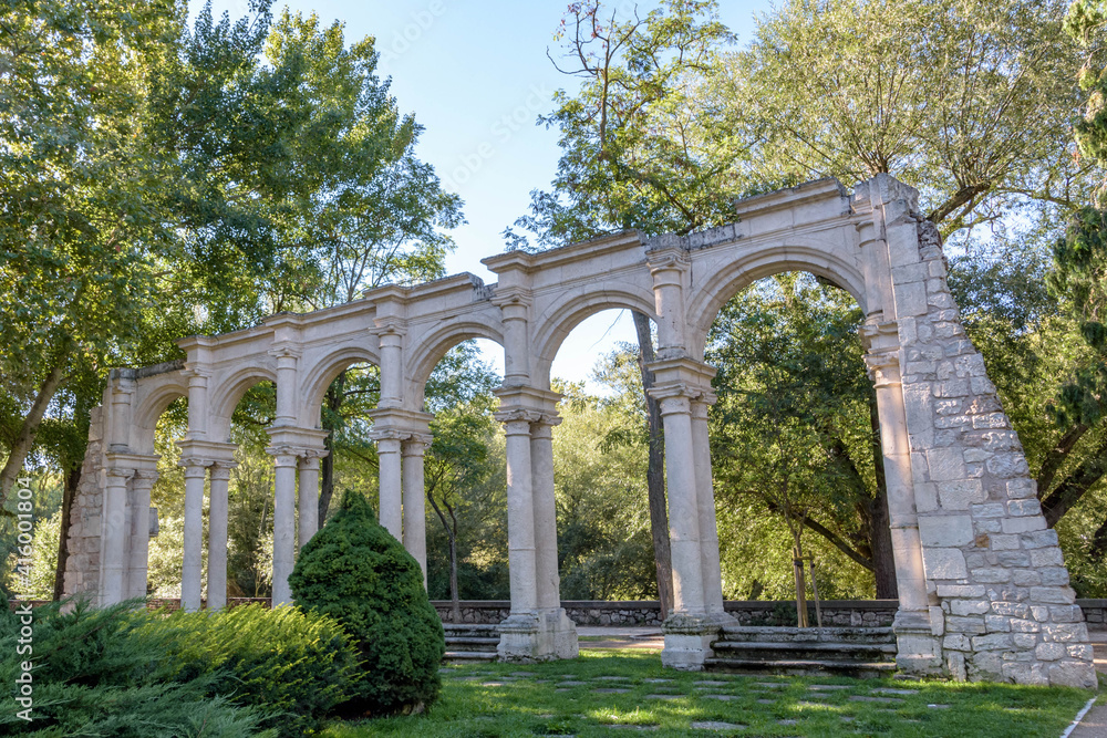 Arcos de Castilfale on the island promenade in Burgos. Romantic garden in Burgos, Castile and Leon, Spain